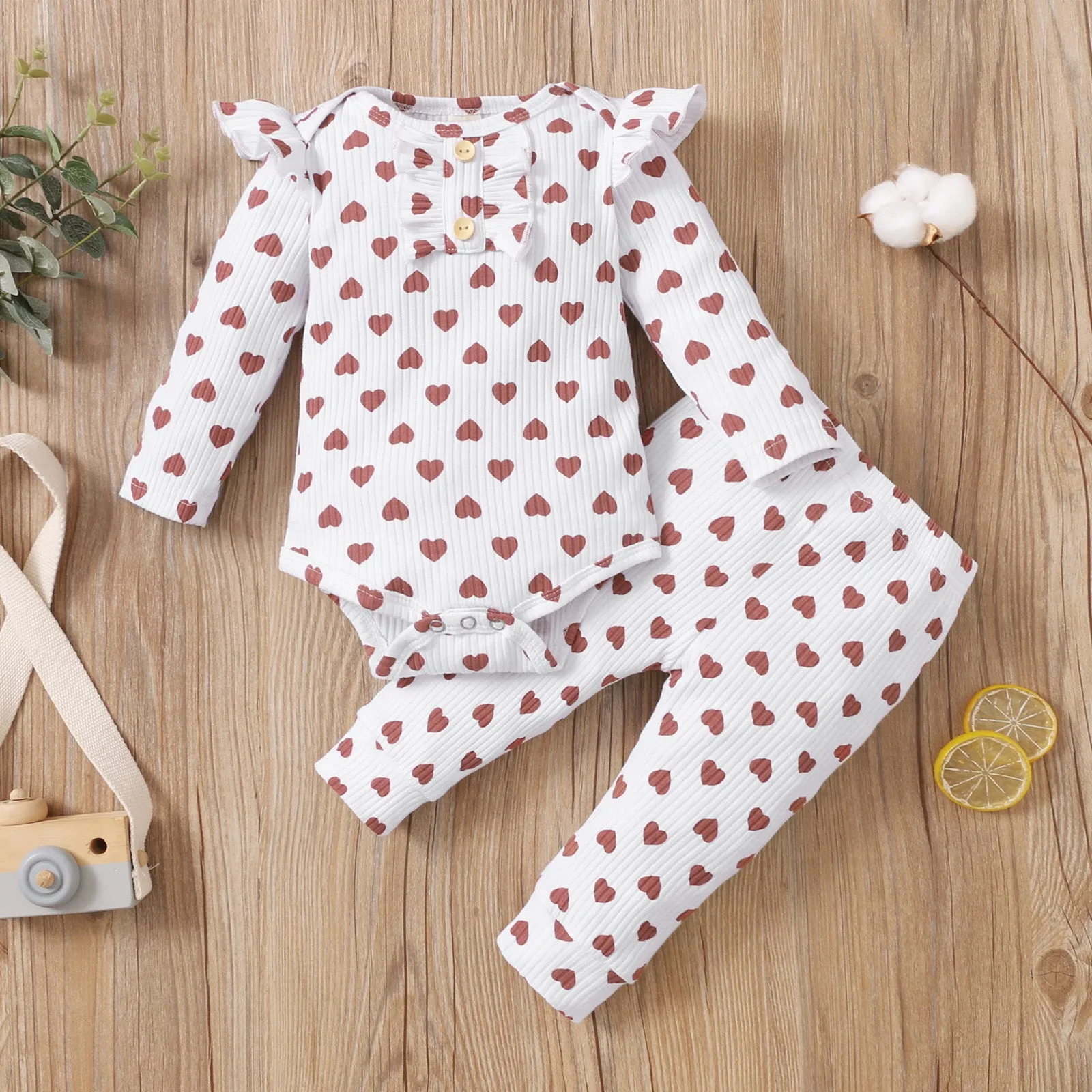 2pcs Cotton All Over Love Heart Print Baby Long-sleeve Ribbed Romper and Pants Set