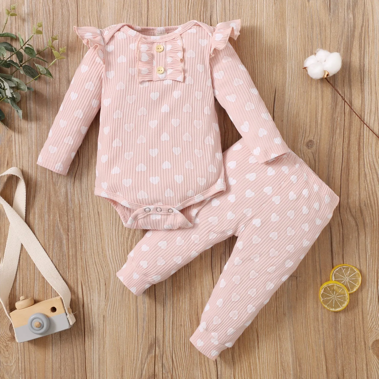 2pcs Cotton All Over Love Heart Print Baby Long-sleeve Ribbed Romper and Pants Set